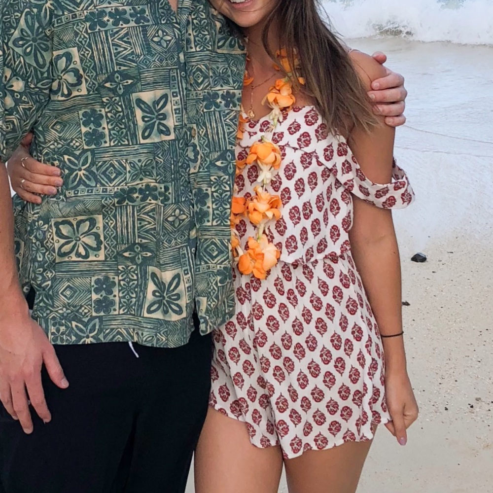LF romper with red detailing